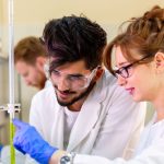 Scientists conducting research in a lab